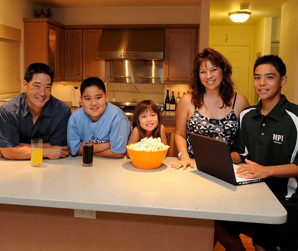 A-family-in-the-kitchen-smiling